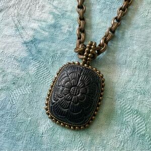 Stephen Dweck carved blue goldstone pendant and bronze chain.